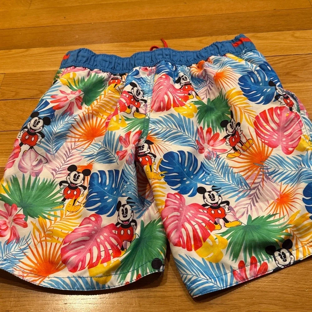 Disney store men’s swim shorts size small ,